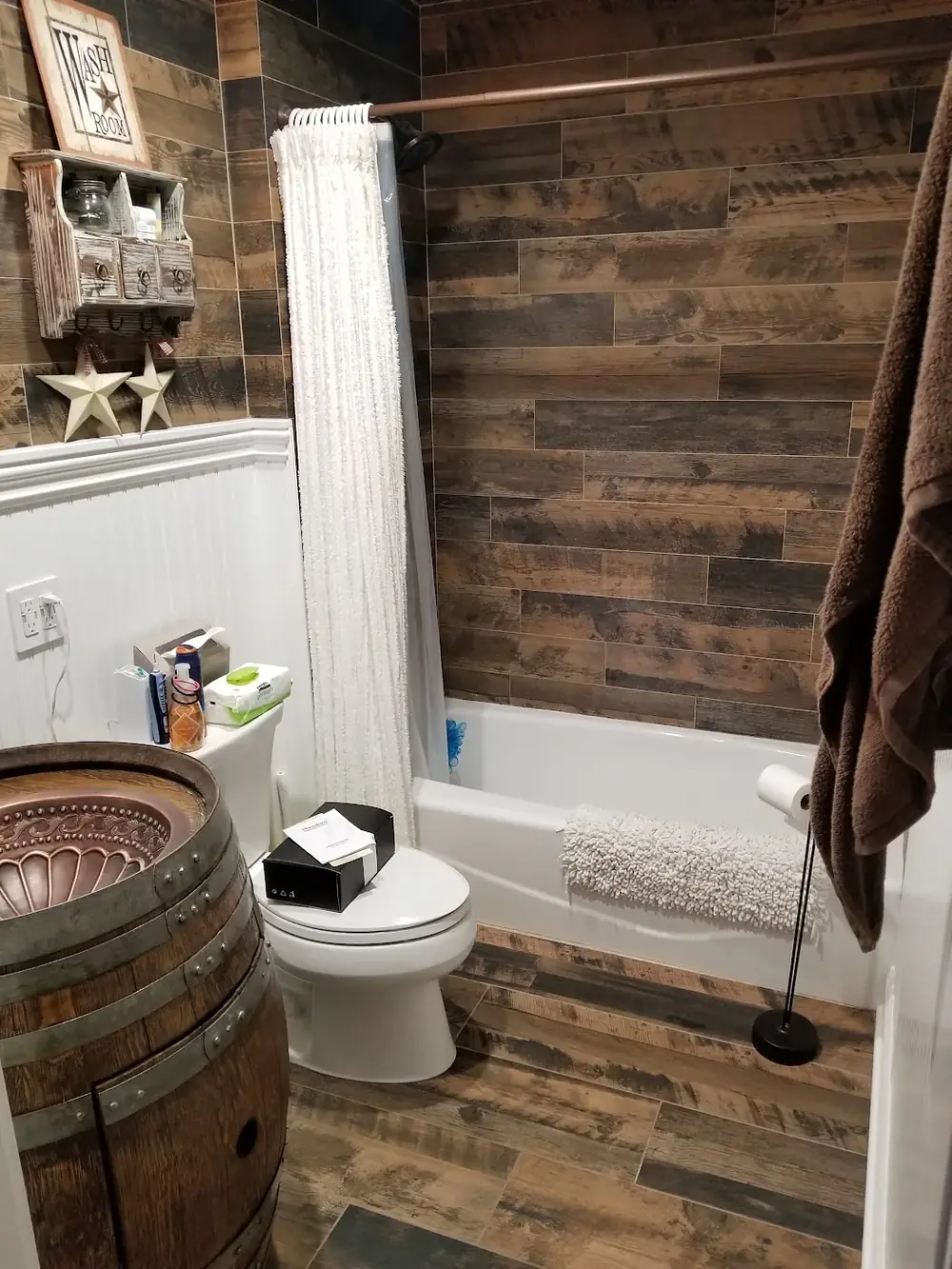 Finished bathroom remodel with copper vessel sink by Absolute Precision Plumbing & Heating, Bergen County NJ