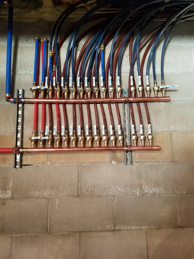 Copper and PEX home-run manifold installed by Absolute Precision Plumbing & Heating, Bergen County NJ