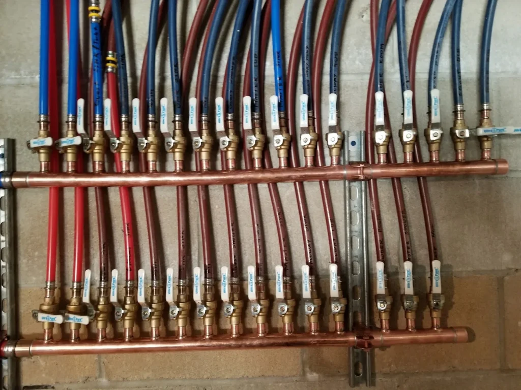 Whole-house copper and PEX repiping manifold by Absolute Precision, Saddle Brook / Bergen County NJ