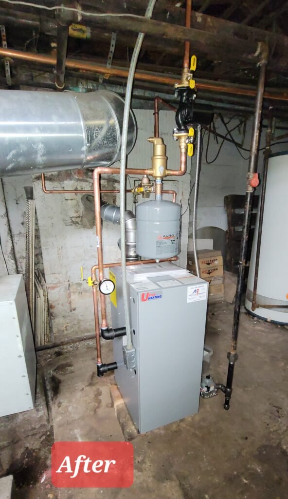 After: new hot water boiler with copper piping and an expansion tank installed by Absolute Precision