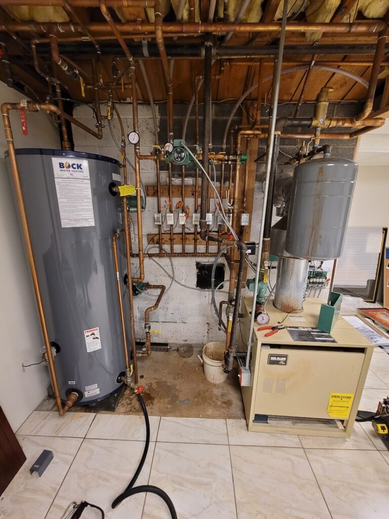 Leaking expansion tank on a hot water boiler system, a common boiler repair problem