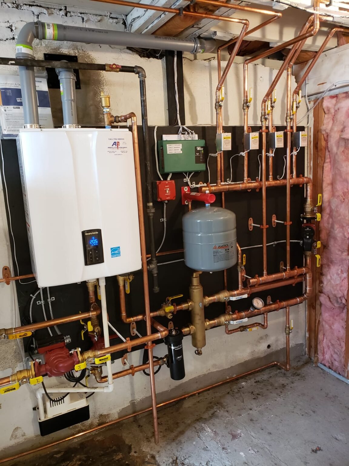 Boiler replacement: Navien NHB high efficiency condensing boiler with zone valves and expansion tank installed by Absolute Precision
