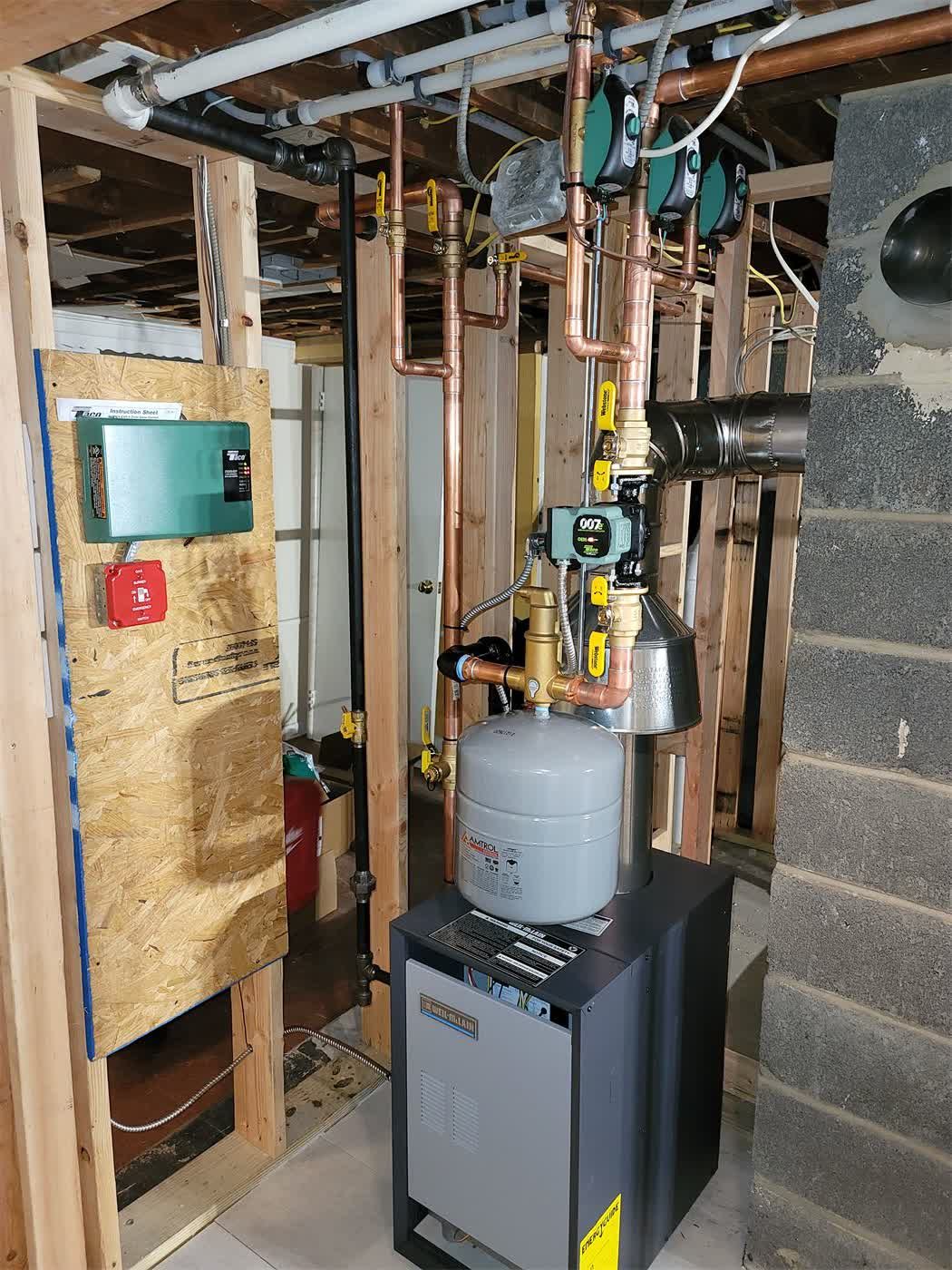 Weil-McLain gas boiler installed by Absolute Precision Plumbing and Heating in Elmwood Park, NJ