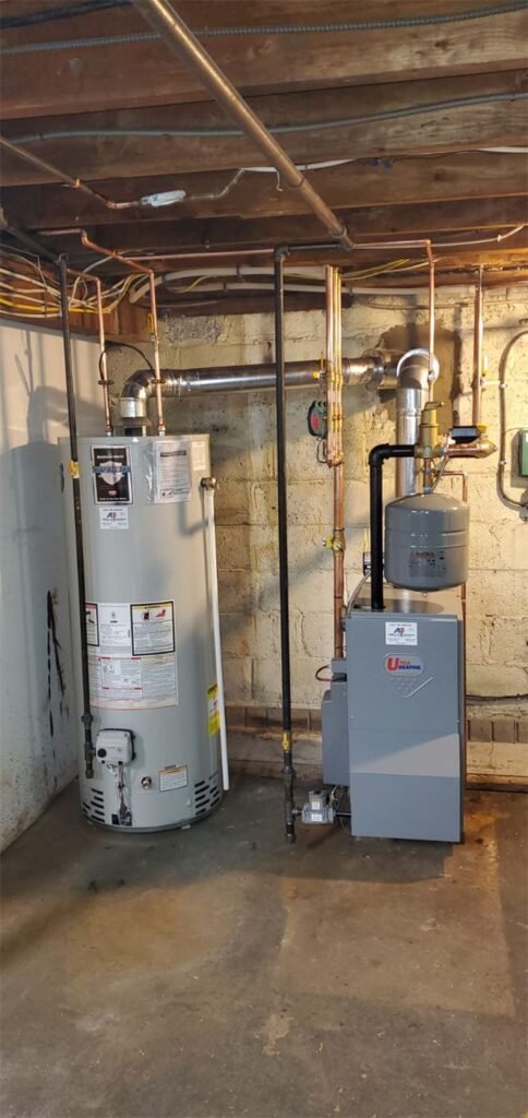 Bradford White water heater and Utica Heating gas boiler installed together by Absolute Precision Plumbing and Heating in Fair Lawn, NJ