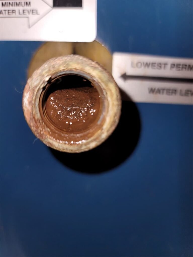 Steam boiler cleared of sediment buildup by Absolute Precision Plumbing and Heating in Park Ridge, NJ