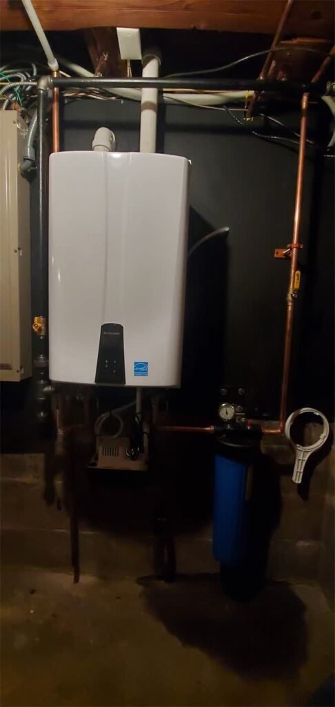 Navien tankless water heater with water filtration installed by Absolute Precision Plumbing and Heating in Elmwood Park, NJ