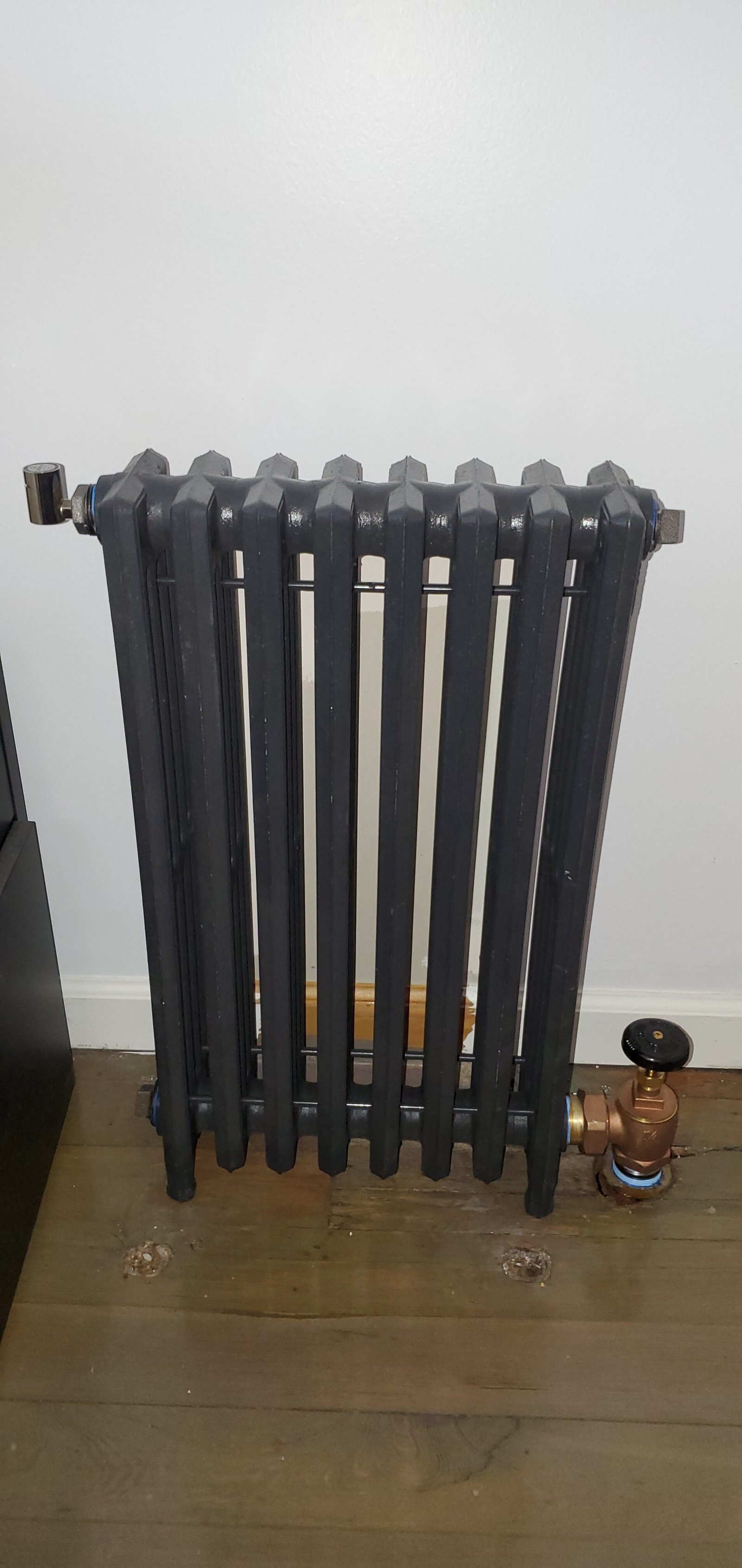 Why is my radiator cold at the top? (steam and hot water)